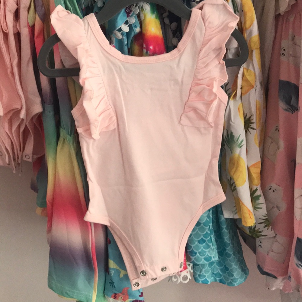 Pink ruffle onesie, new